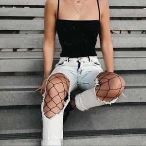 fishnet stockings with denim shorts